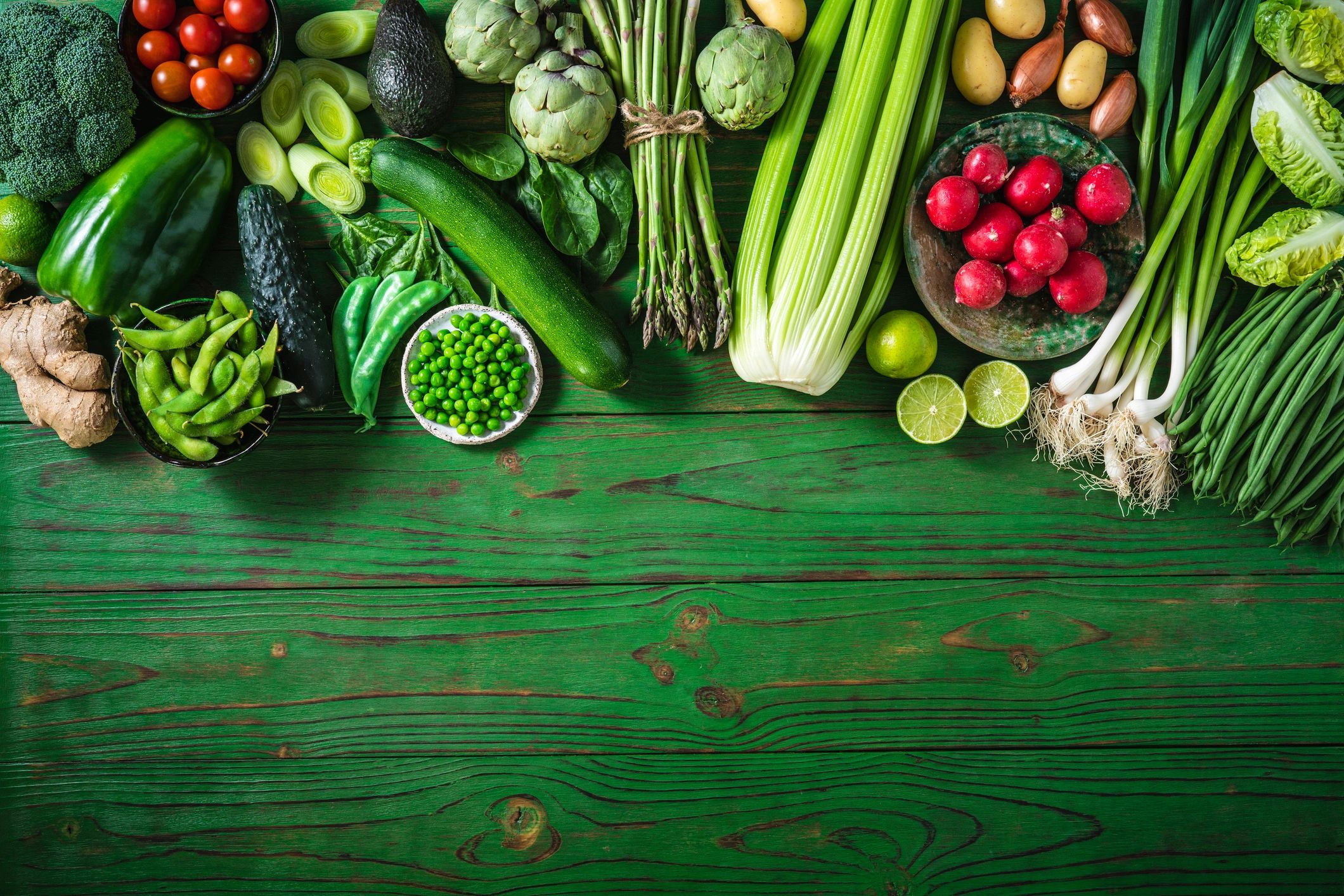 Fresh groceries and vegetables laid out on a table